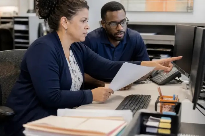 Practice manager comparing medical billing software pricing and workflows