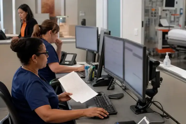 Practice administrator preparing credentialing for a new physician