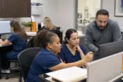 Medical billing team reviewing AI-assisted workflow recommendations