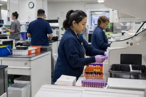 Medical Laboratory practice staff managing patient and billing workflows