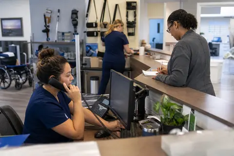 Orthopedics practice staff managing patient and billing workflows